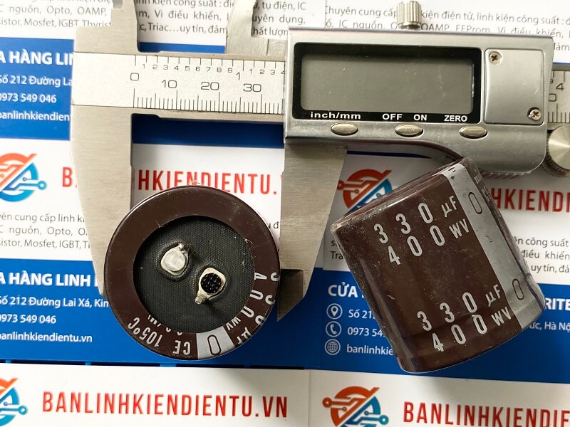 Alternative view of Tụ hóa Nichicon 330uF 400V 35x35mm (tháo máy)