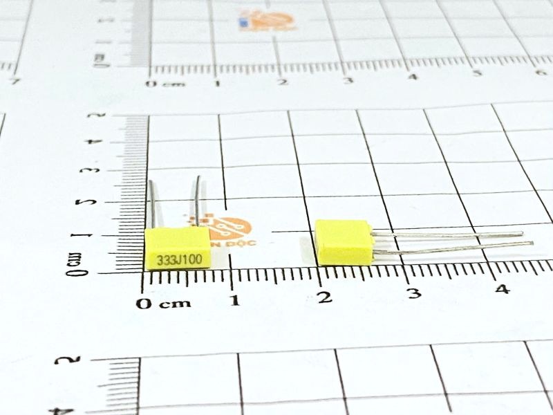 Tụ điện không phân cực 333J 100V vuông vàng